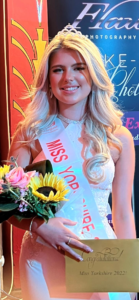Millie in her Miss Yorkshire sash and crown