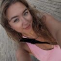 A woman in a pink top